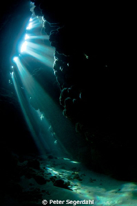 Sun rays in the cave by Peter Segerdahl 